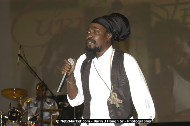Junior Reid - Cure Fest 2007 - Longing For Concert at Trelawny Multi Purpose Stadium, Trelawny, Jamaica - Sunday, October 14, 2007 - Cure Fest 2007 October 12th-14th, 2007 Presented by Danger Promotions, Iyah Cure Promotions, and Brass Gate Promotions - Alison Young, Publicist - Photographs by Net2Market.com - Barry J. Hough Sr, Photographer - Negril Travel Guide, Negril Jamaica WI - http://www.negriltravelguide.com - info@negriltravelguide.com...!