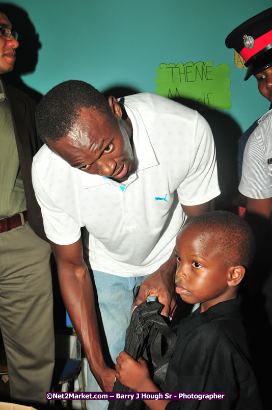 Usain Bolt of Jamaica - The Fastest Man In The World  - Usain Bolt Homecoming Celebrations - Press Conference at the Grand Bahia Principe &amp; Sherwood Content - Waldensia Primary School - Photographs by Net2Market.com - Barry J. Hough Sr. Photojournalist/Photograper - Photographs taken with a Nikon D300 - Negril Travel Guide, Negril Jamaica WI - http://www.negriltravelguide.com - info@negriltravelguide.com...!